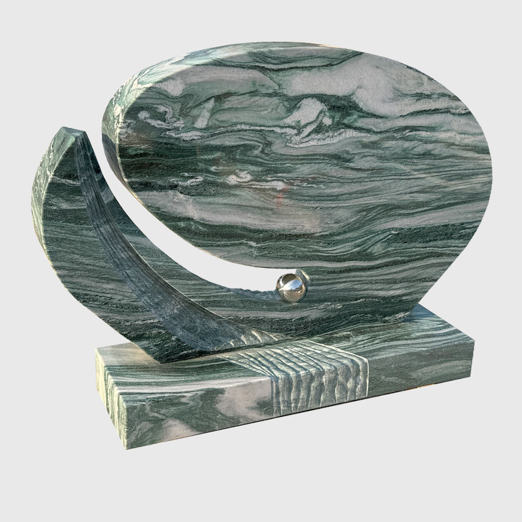 Grabmal aus Atlantis Granit, poliert mit Edelstahlkugel und Ornamentik im Sockel – Stone Lounge