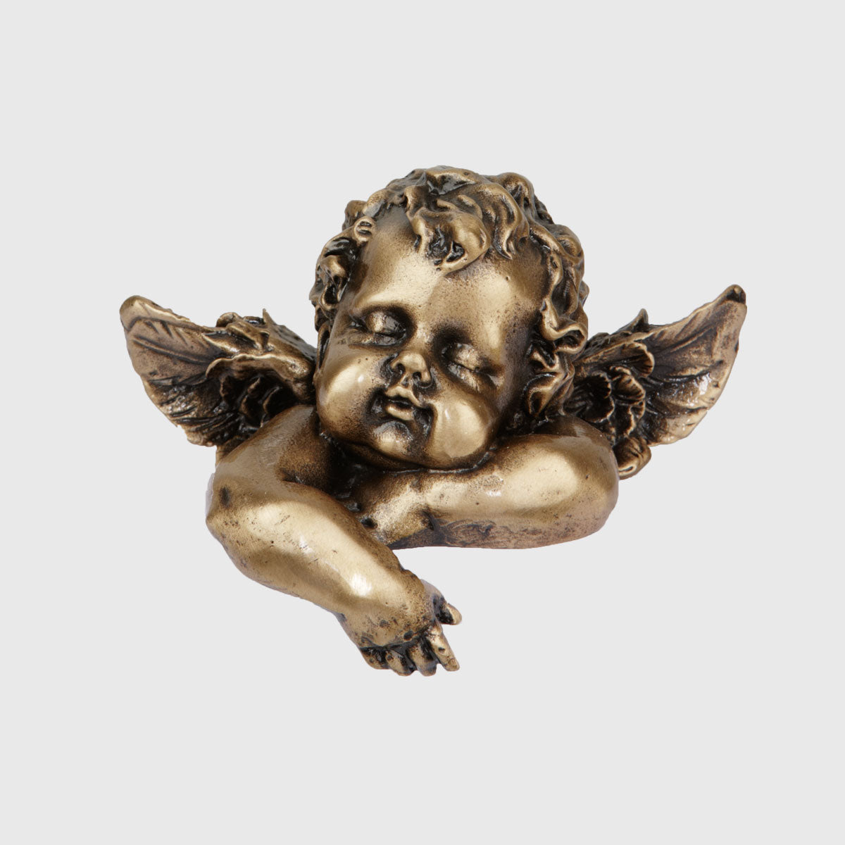 Schlafender Bronze Engel mit Flügeln als Grabschmuck.