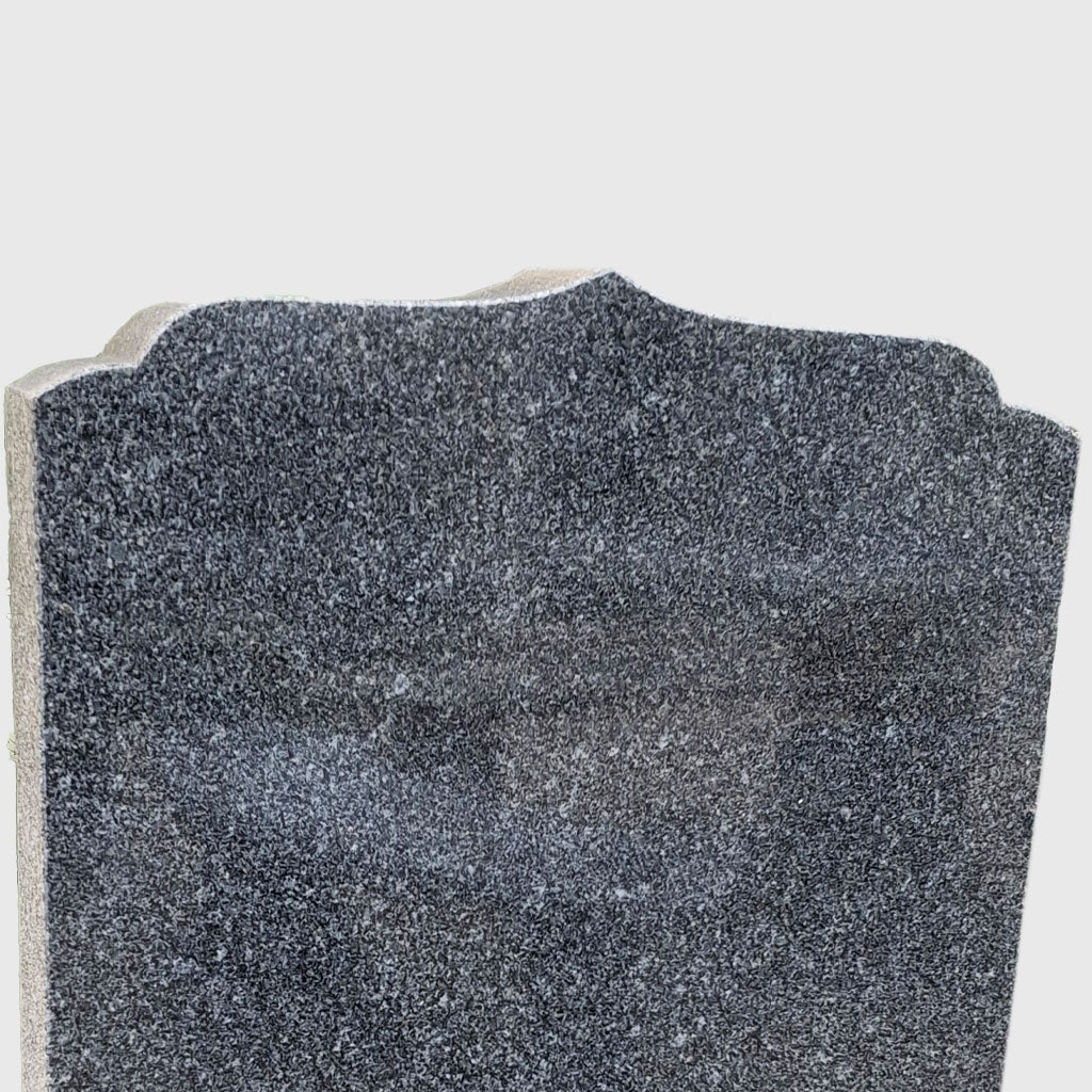 Grabstein aus Gebhartser Granit mit Wiener Kopf